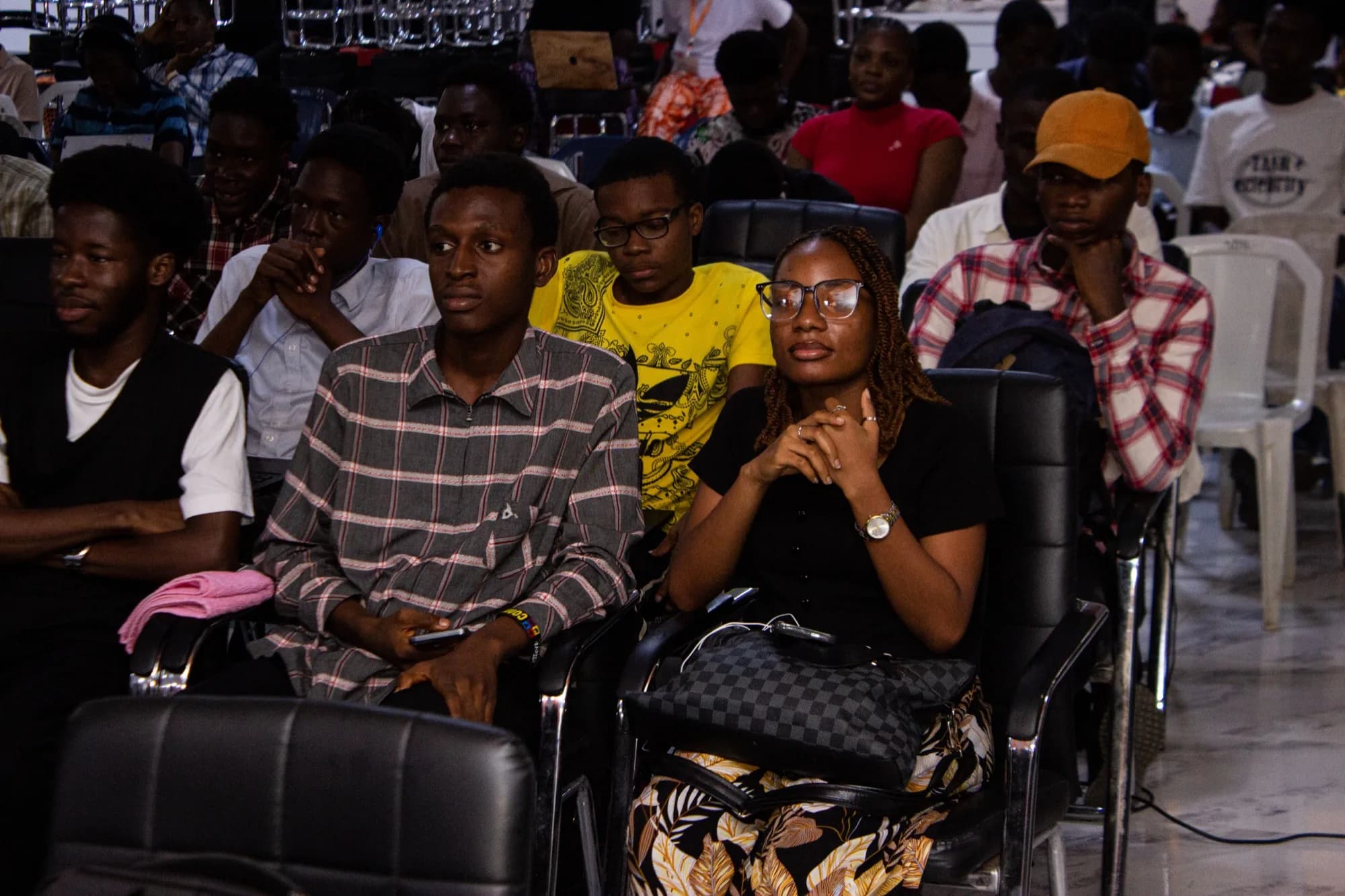 Students watching the final presentations