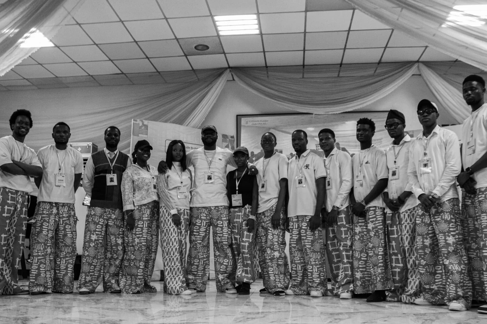 The club executives, in black and white