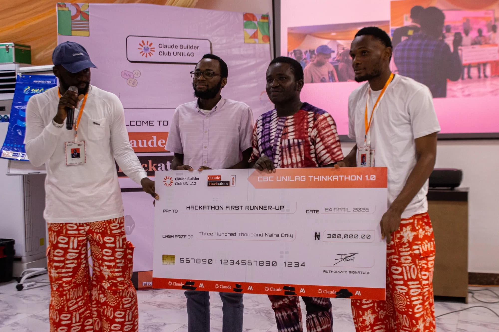 Team Quorum receiving their second place cheque