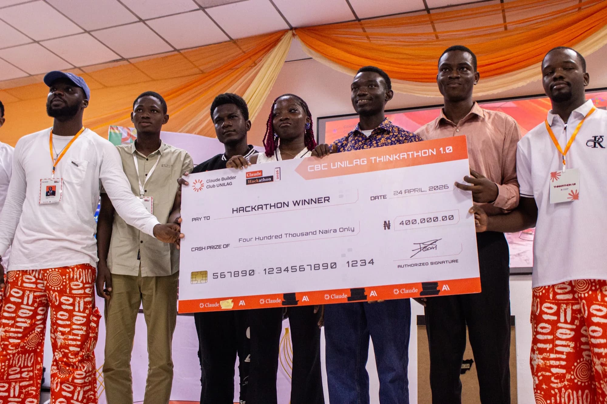 Team TheNextMe receiving their first place cheque